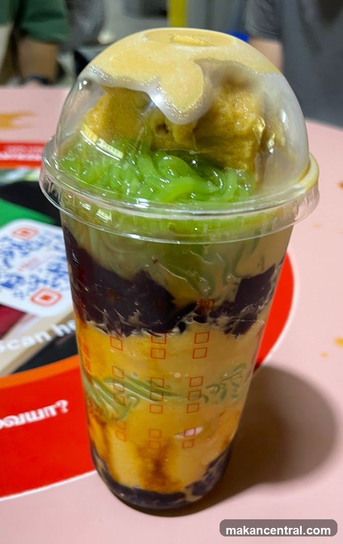 Beverage in plastic cup with lid