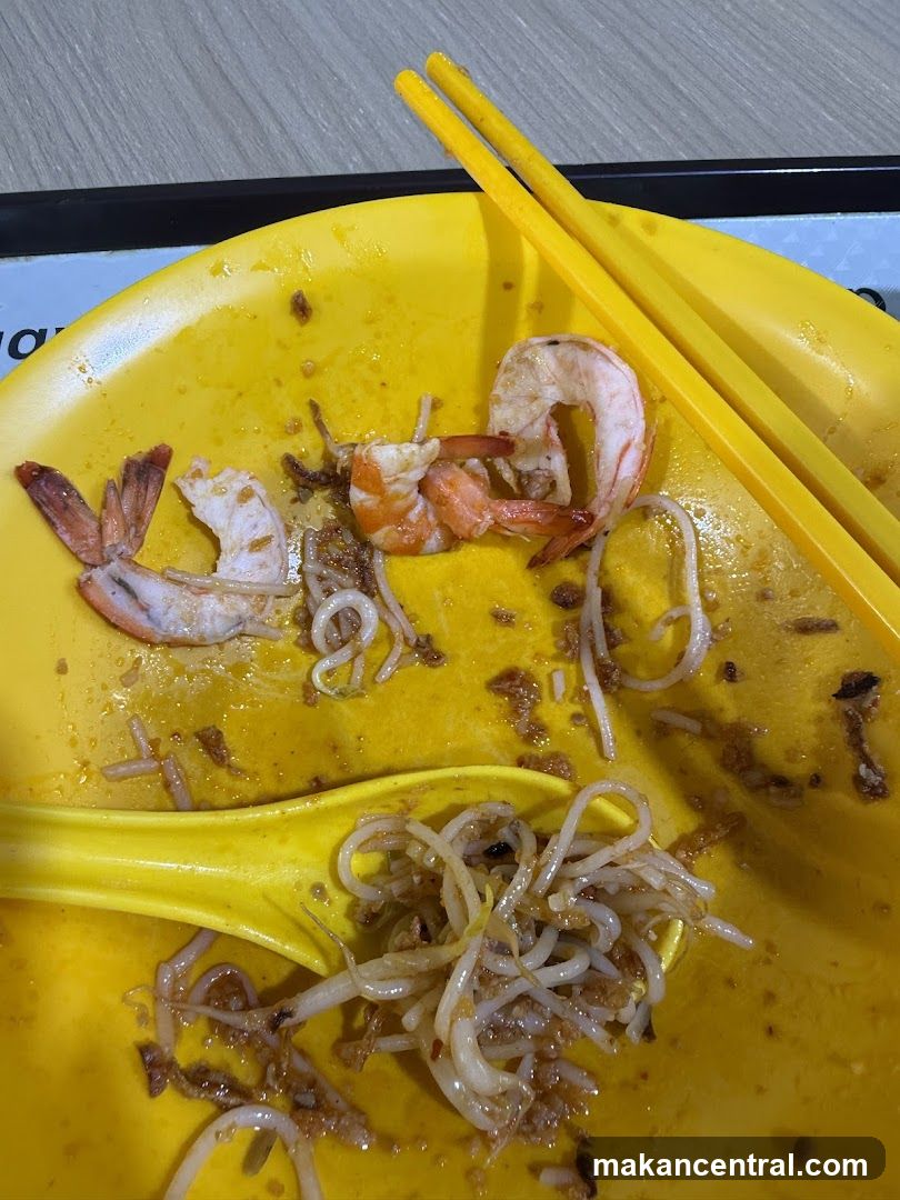 Eaten meal on yellow plate