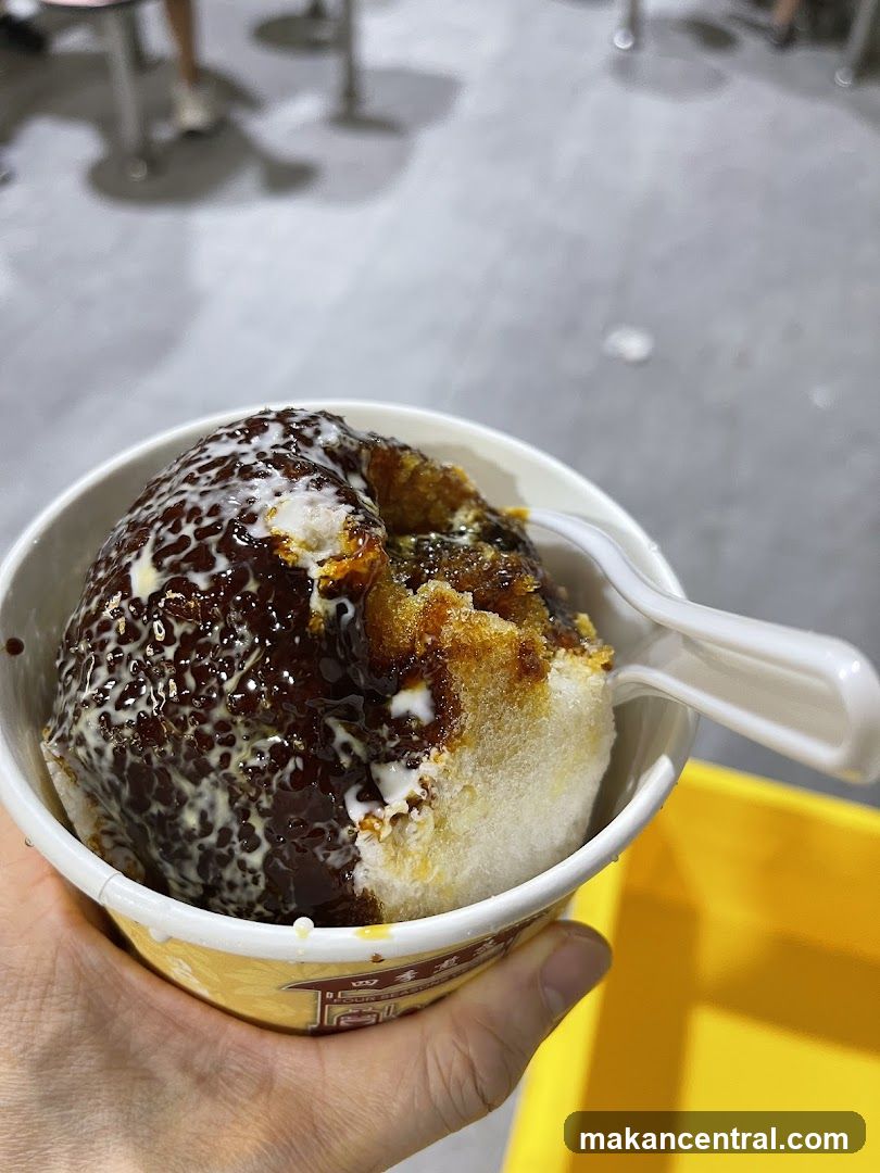 Hand holding dessert cup