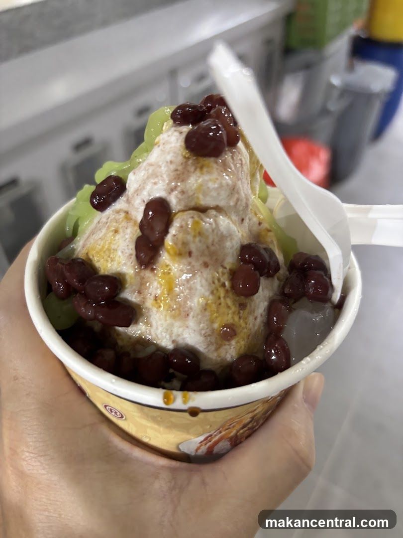 Hand holding dessert cup