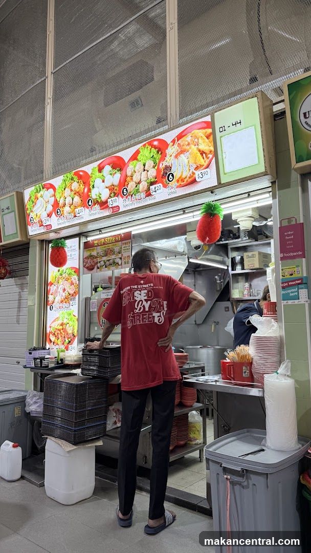 Food stall interior with staff