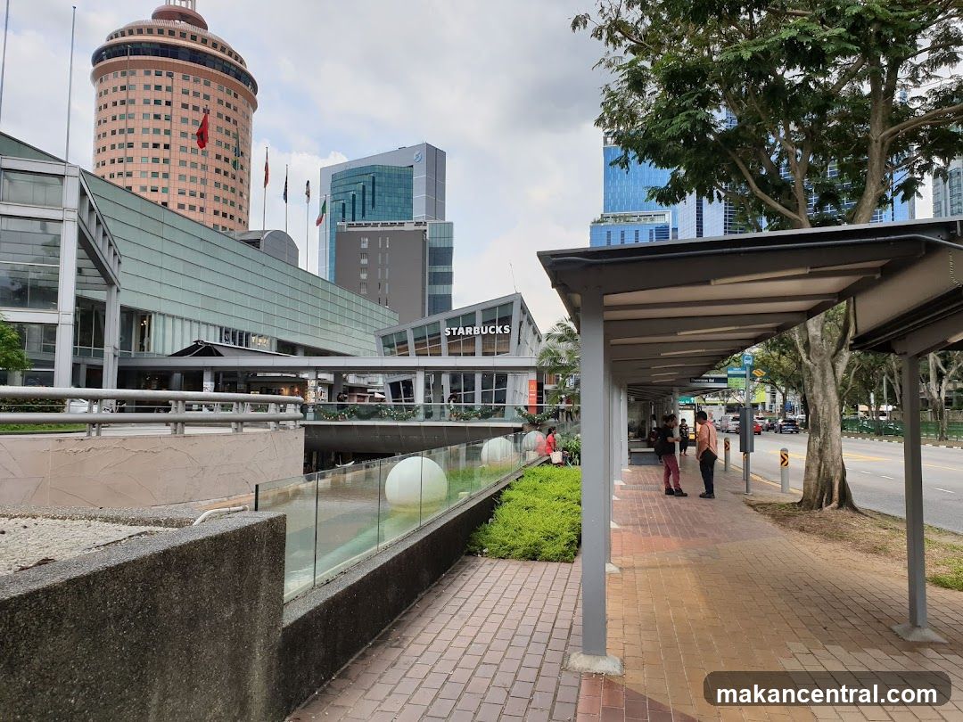 Urban street scene with modern buildings and a Starbucks storefront
