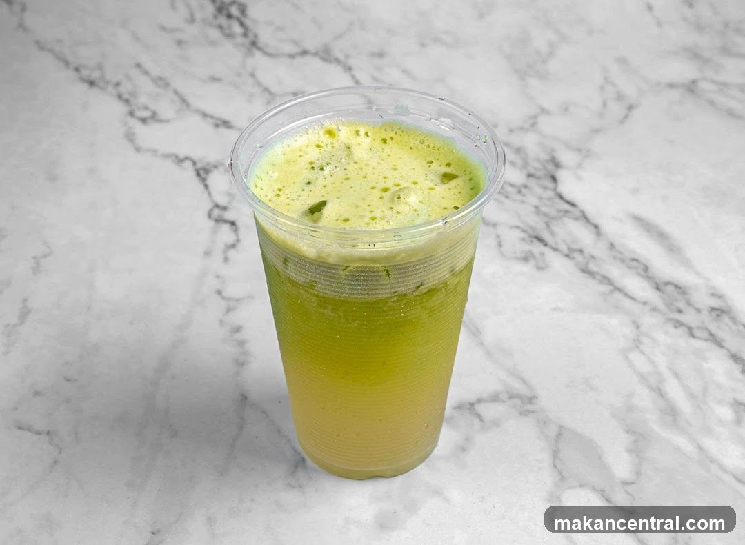 Green Juice in Plastic Cup