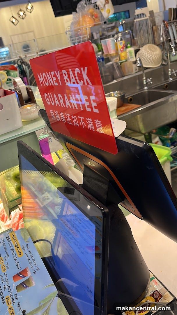 Cashier Counter with Money Back Guarantee Sign