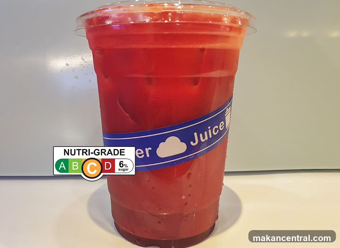 Red beverage in plastic cup