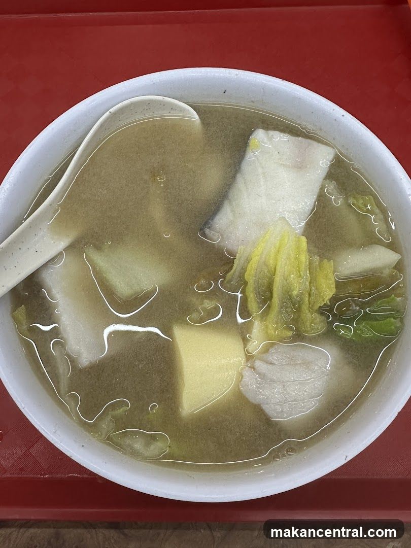 Soup in bowl with spoon