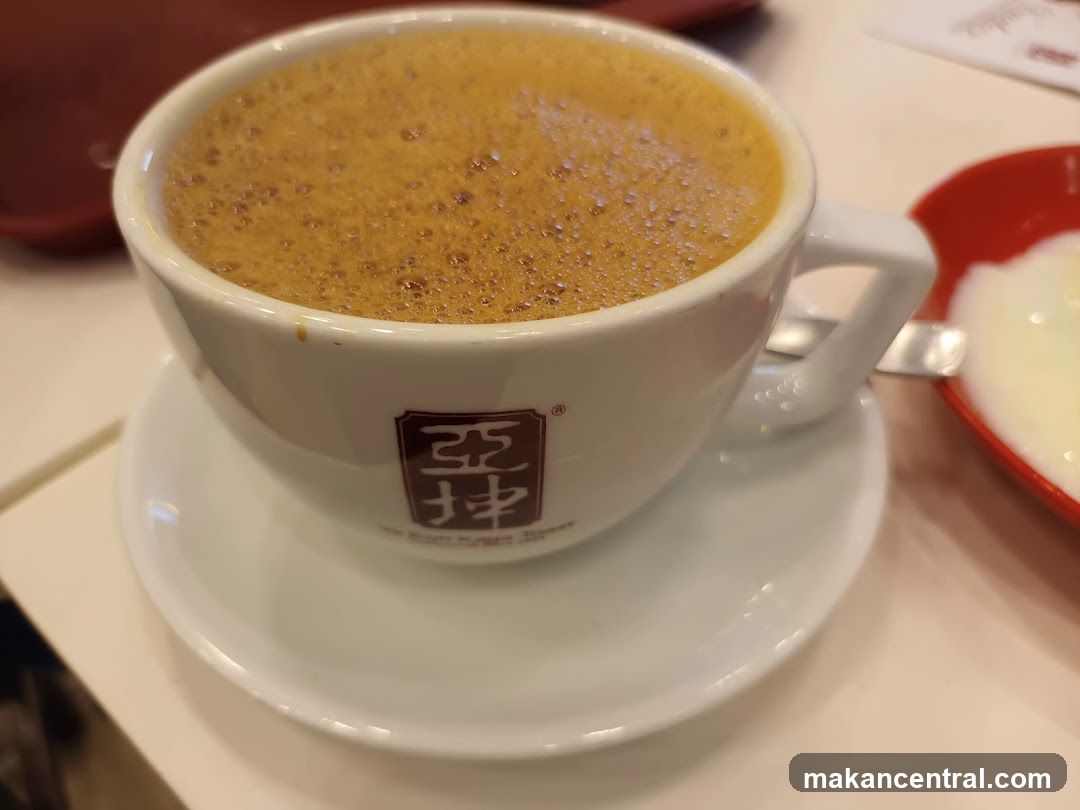Cup of beverage with branded cup