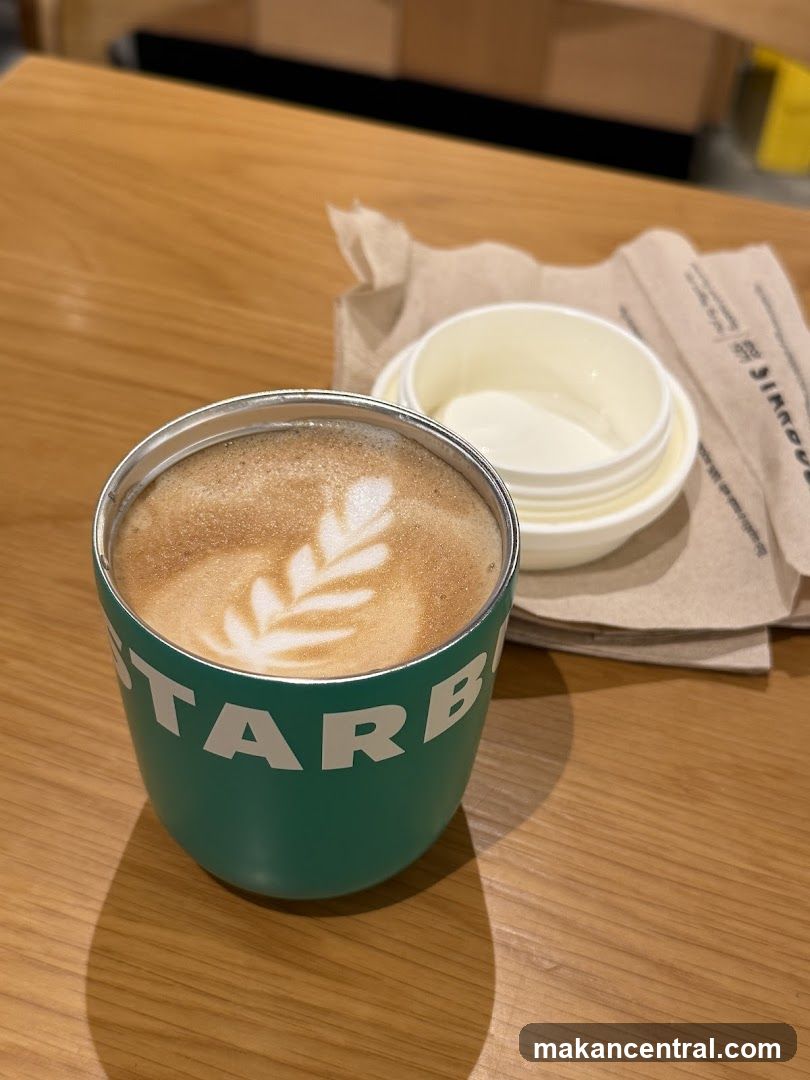 Starbucks Coffee Cup on Wooden Table