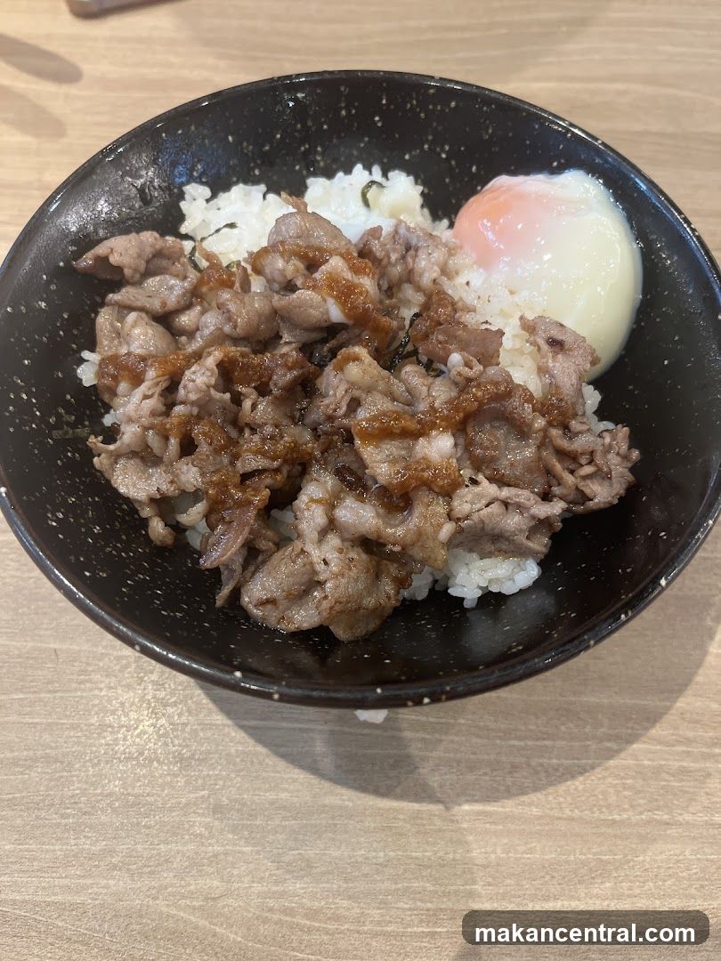 Bowl of beef donburi with egg