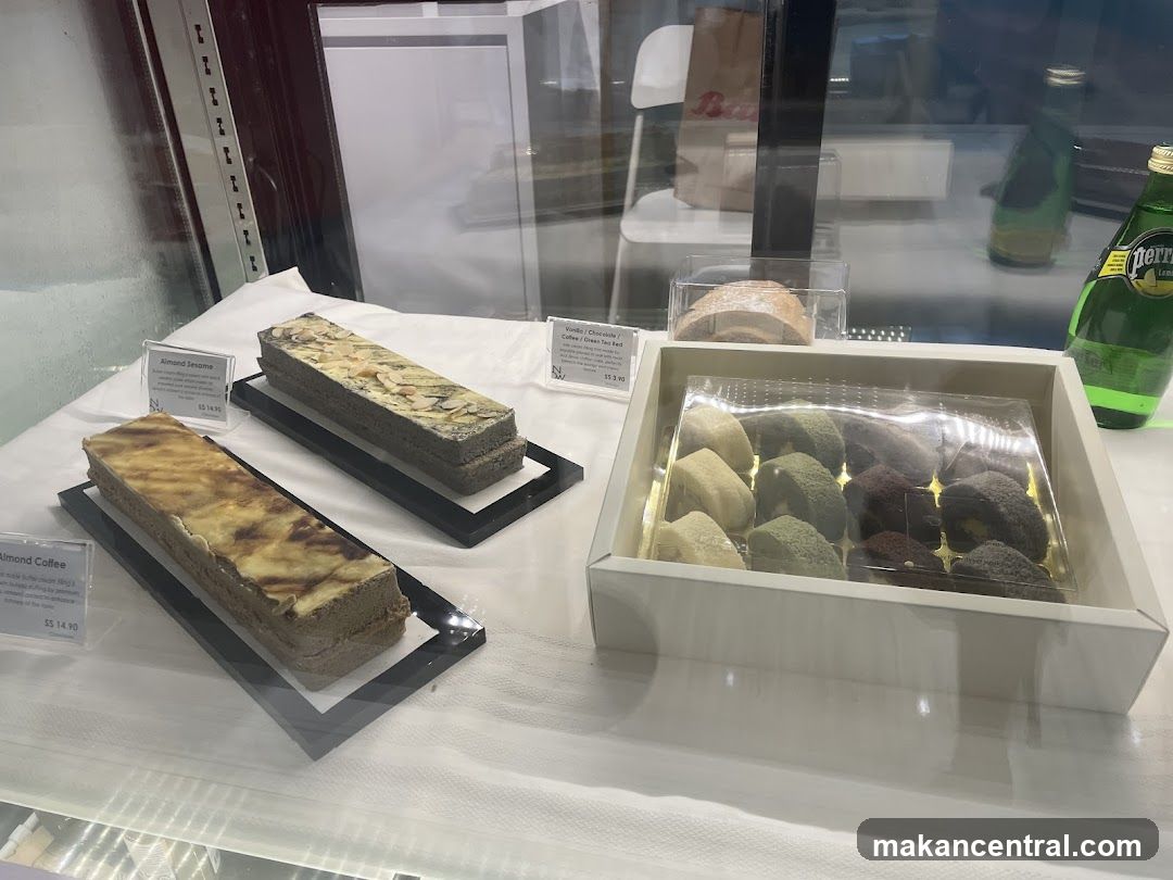 Display Case with Pastries and Drinks