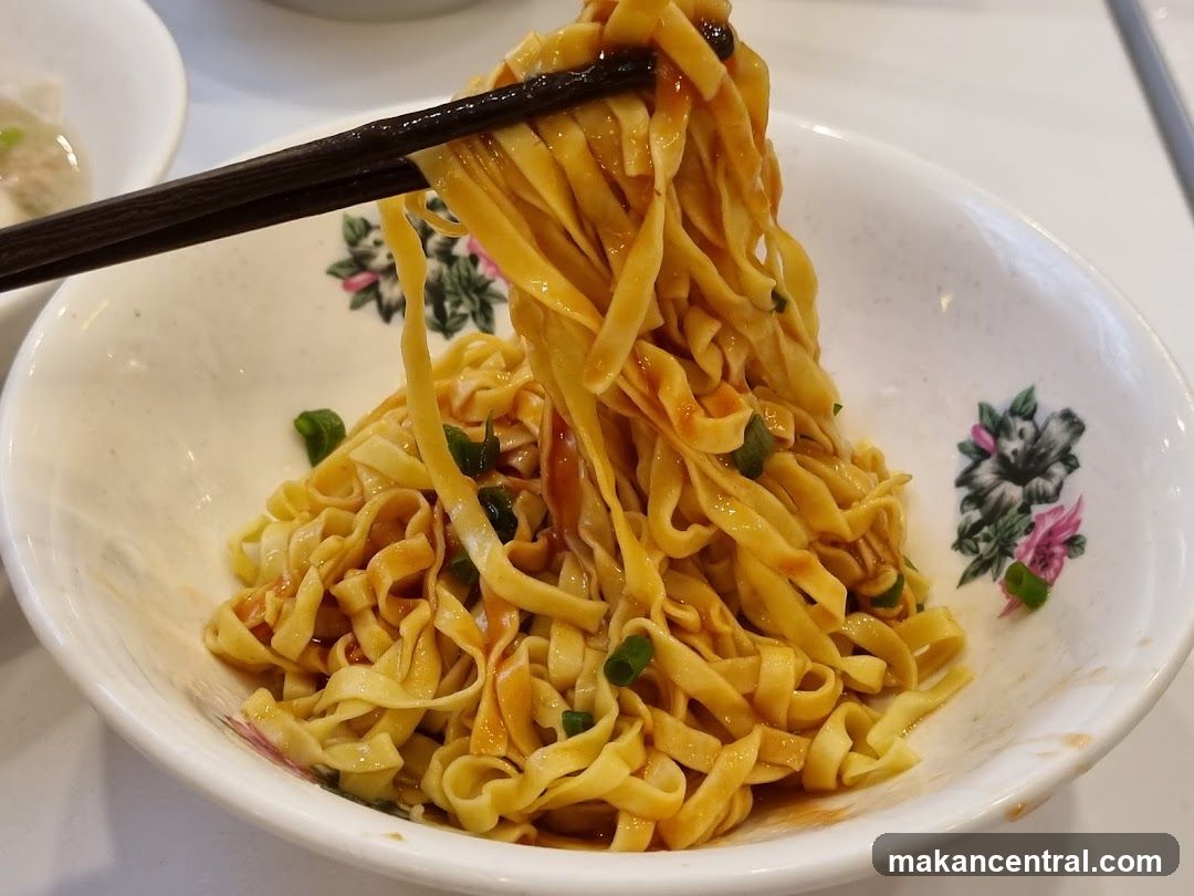 Noodles in bowl with chopsticks