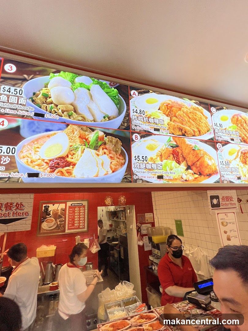 Restaurant interior with staff and counter