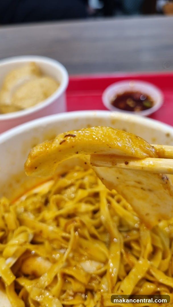 Close-up of noodle dish with chopsticks