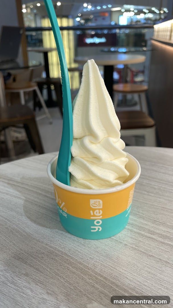 Soft Serve Ice Cream in Cup with Spoon