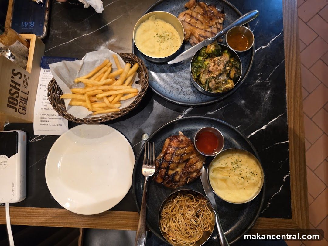 Table with Food and Menu at Josh's Grill