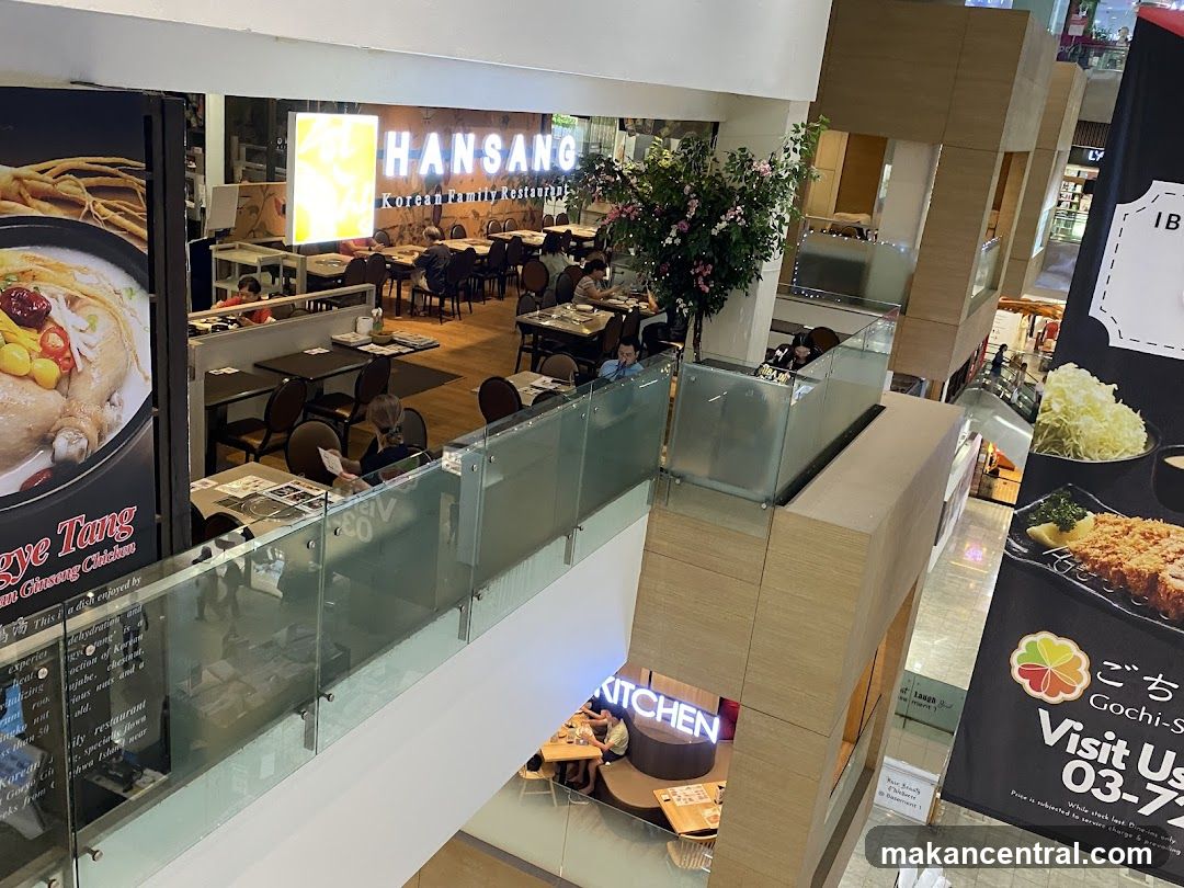 Interior view of a multi-level shopping mall with restaurant
