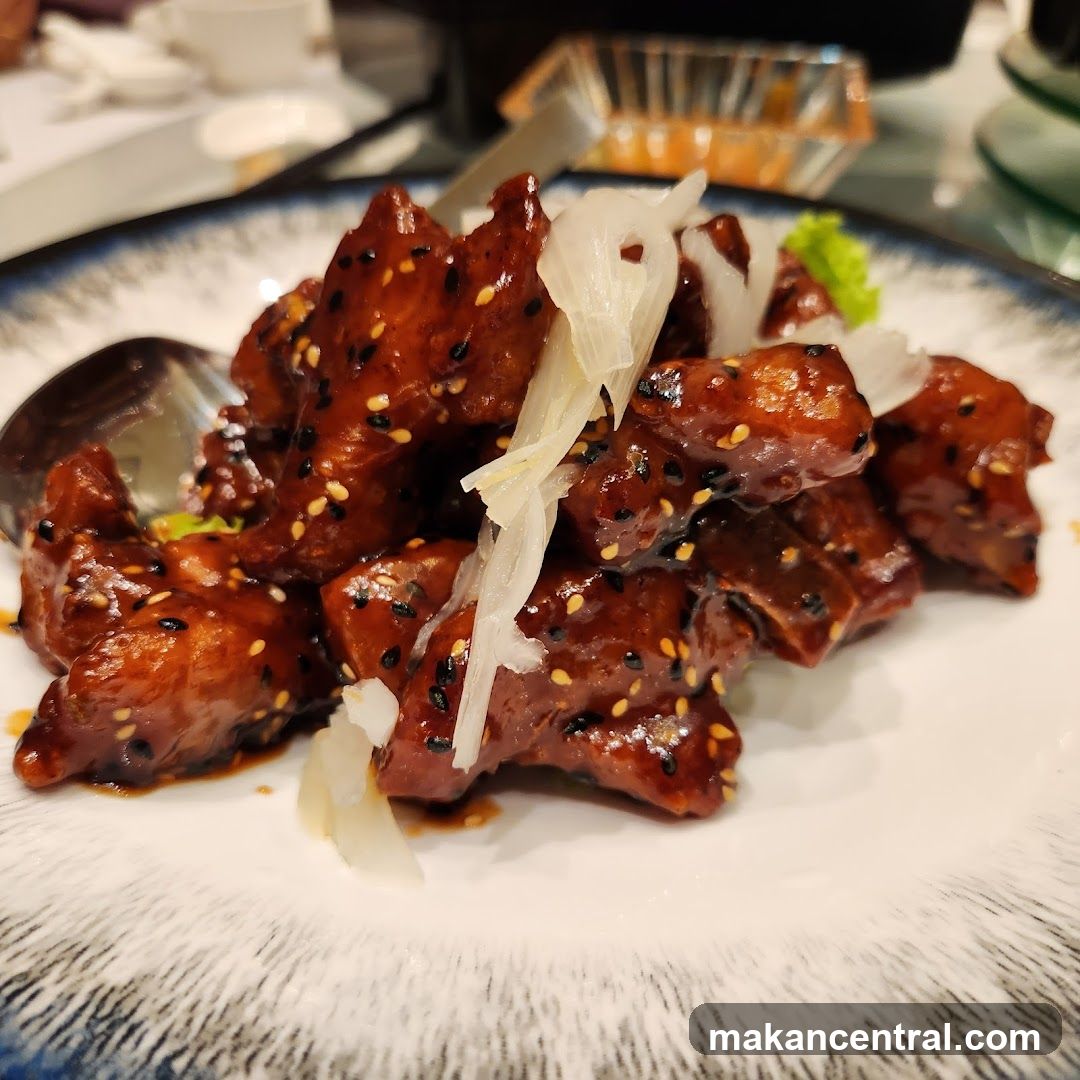Dish of Glazed Meat with Sesame Seeds