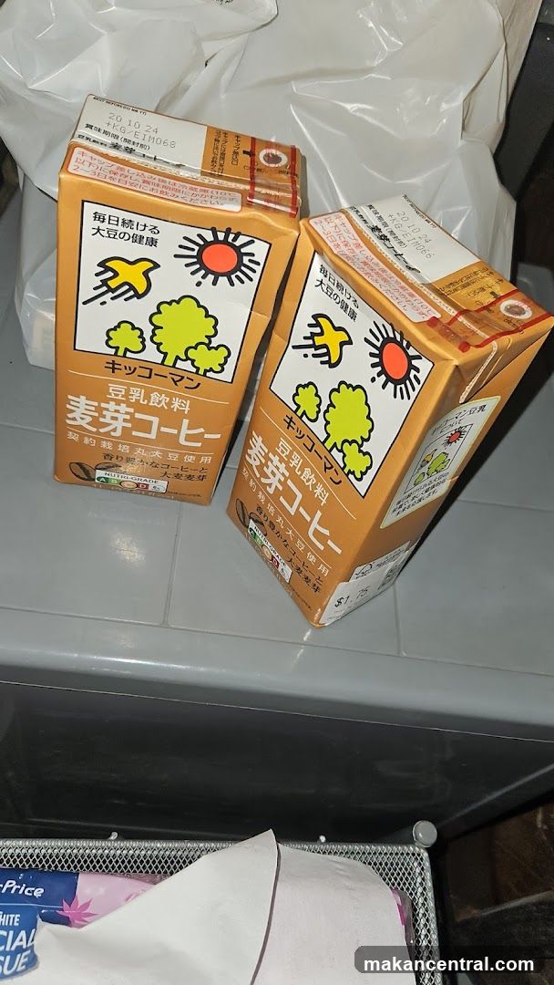 Two cartons of Kikkoman soy coffee