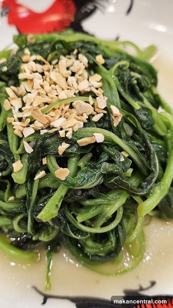 Stir-fried greens with crushed nuts