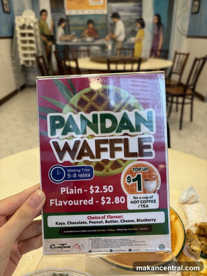 Pandan Waffle Menu Card Held in Restaurant Interior