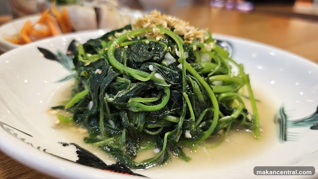 Dish of Stir-Fried Greens with Garlic Crumbs