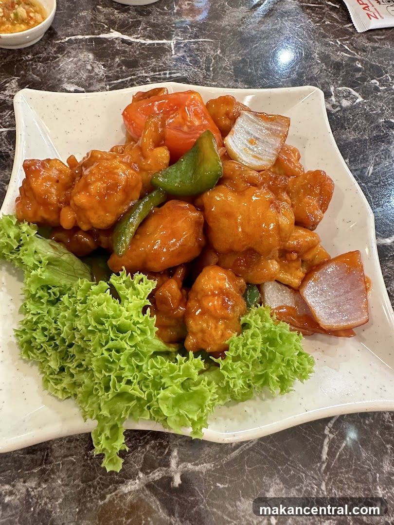 Serving of sweet and sour chicken