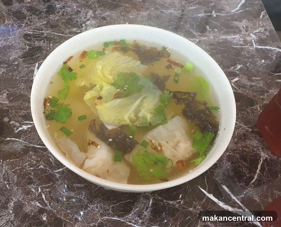 Bowl of Soup on Marble Surface