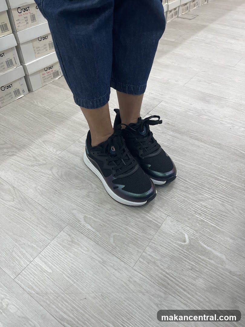Person wearing sneakers in store