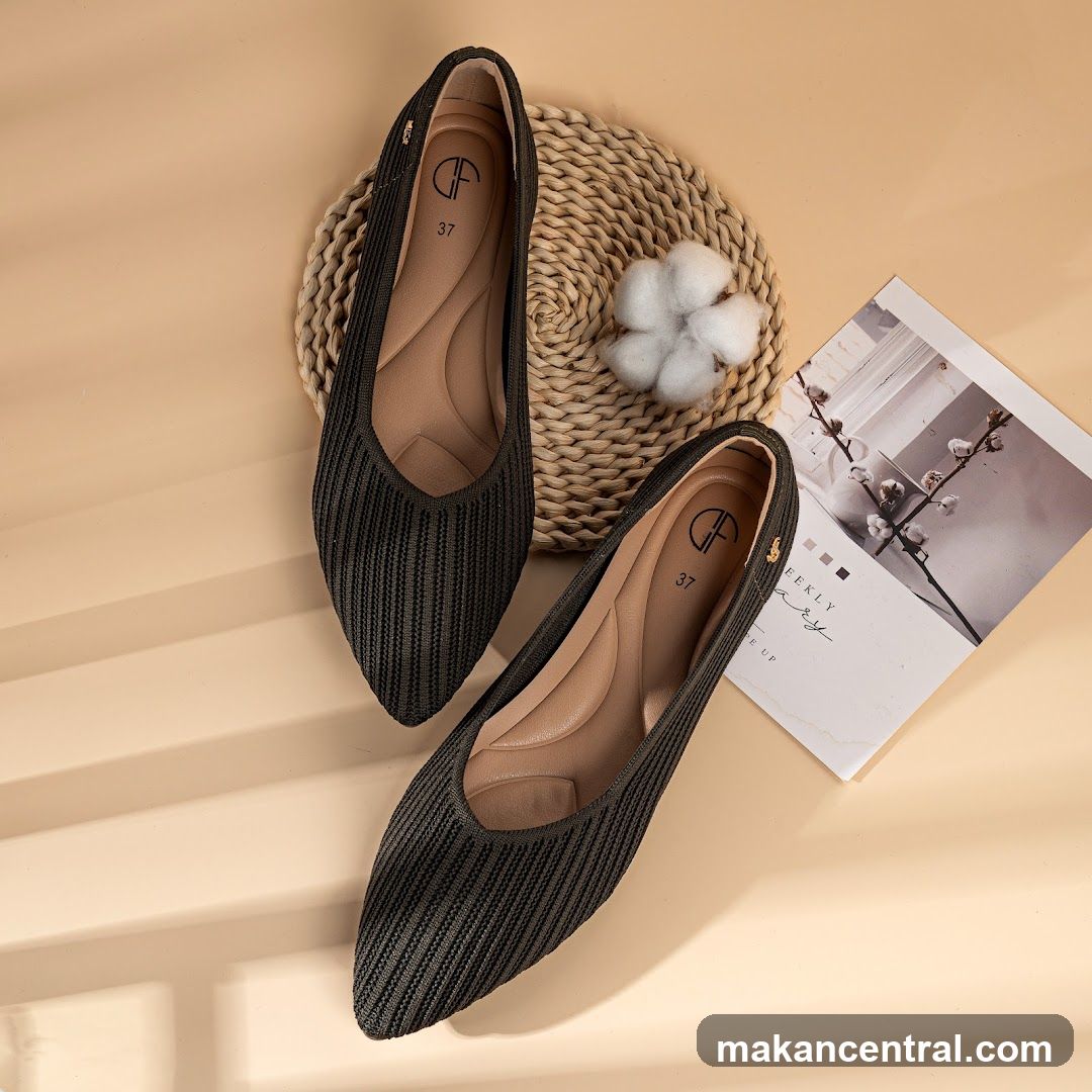 Black Knit Flats on Beige Surface