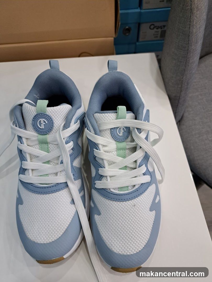 Pair of Light Blue and White Sneakers