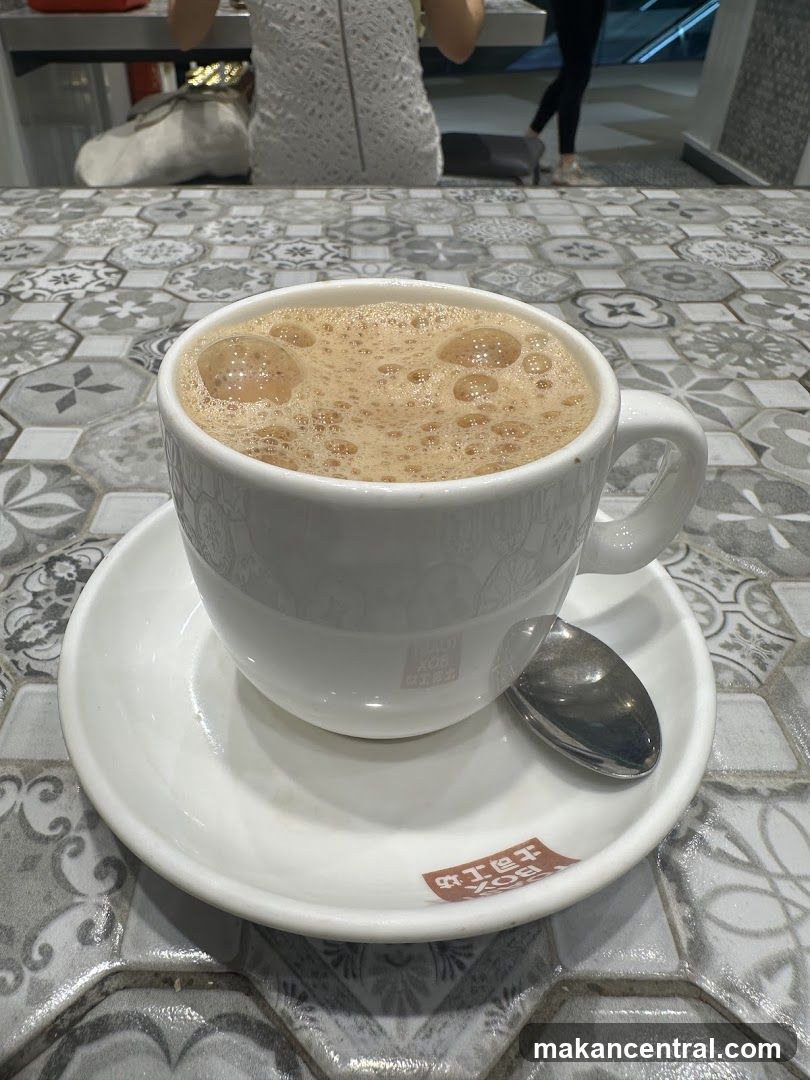 Coffee Cup on Patterned Table
