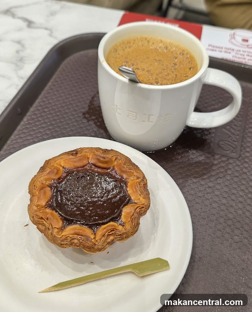 Coffee and pastry on tray