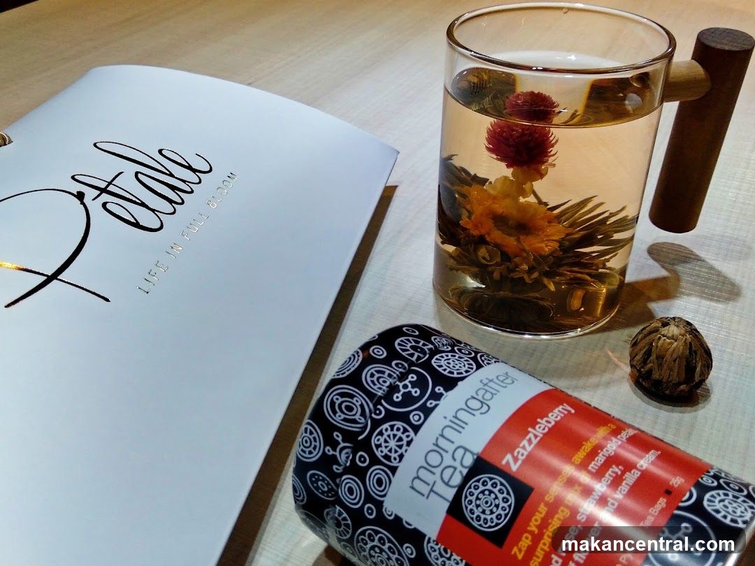 Tea and branded materials on table