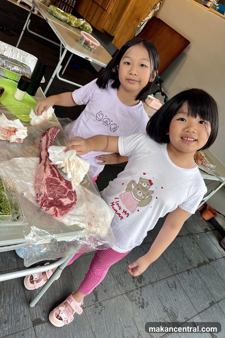 Two children in kitchen setting