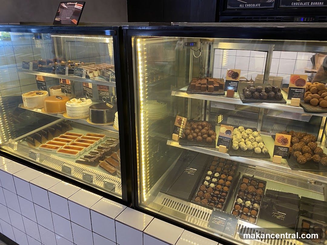 Display Case with Desserts and Chocolate Products