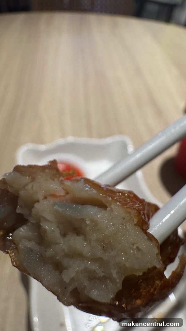 Food being held with chopsticks