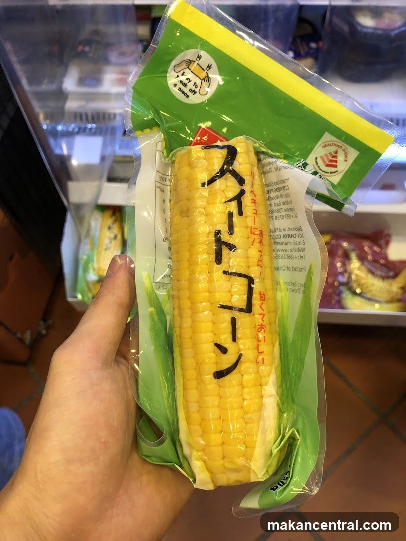 Hand holding packaged corn