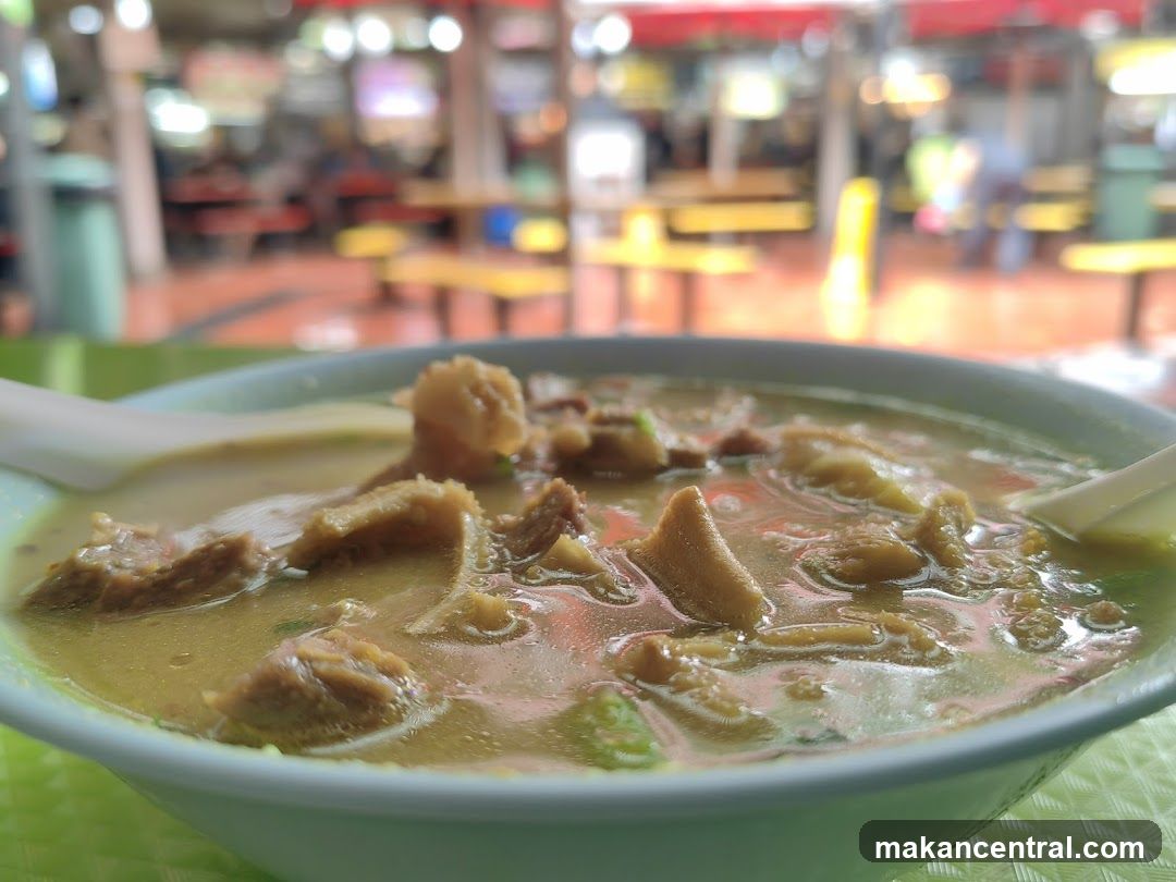 Close-up of a bowl of soup in a food court