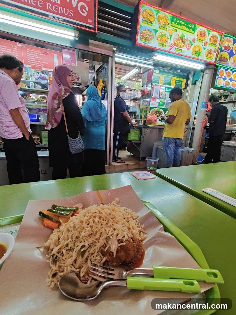 Food court interior with customers and food stall