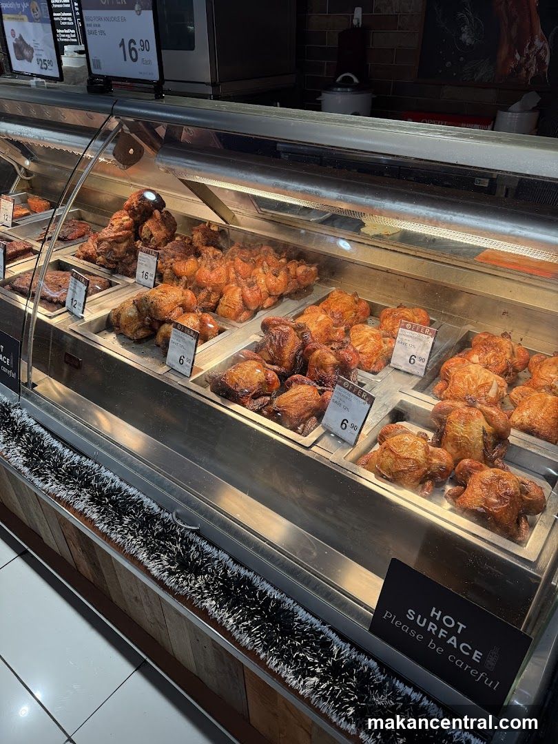 Roasted meat display in a grocery store