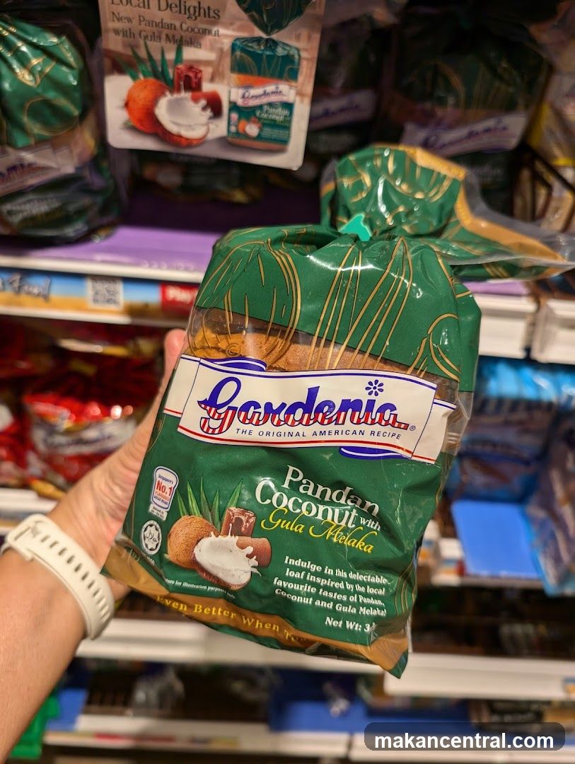 Hand holding Gardenia Pandan Coconut with Gula Melaka product