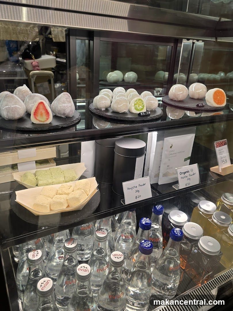 Display Case with Desserts and Beverages