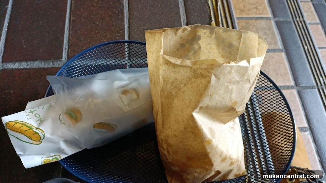 Food packaging on outdoor table