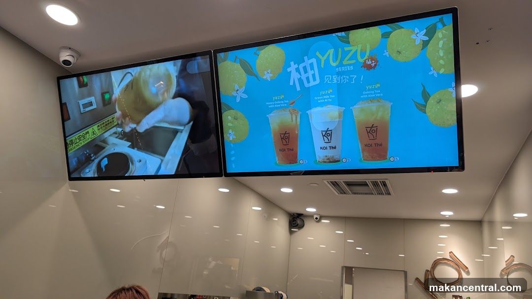 Interior display screens at Koi Thé