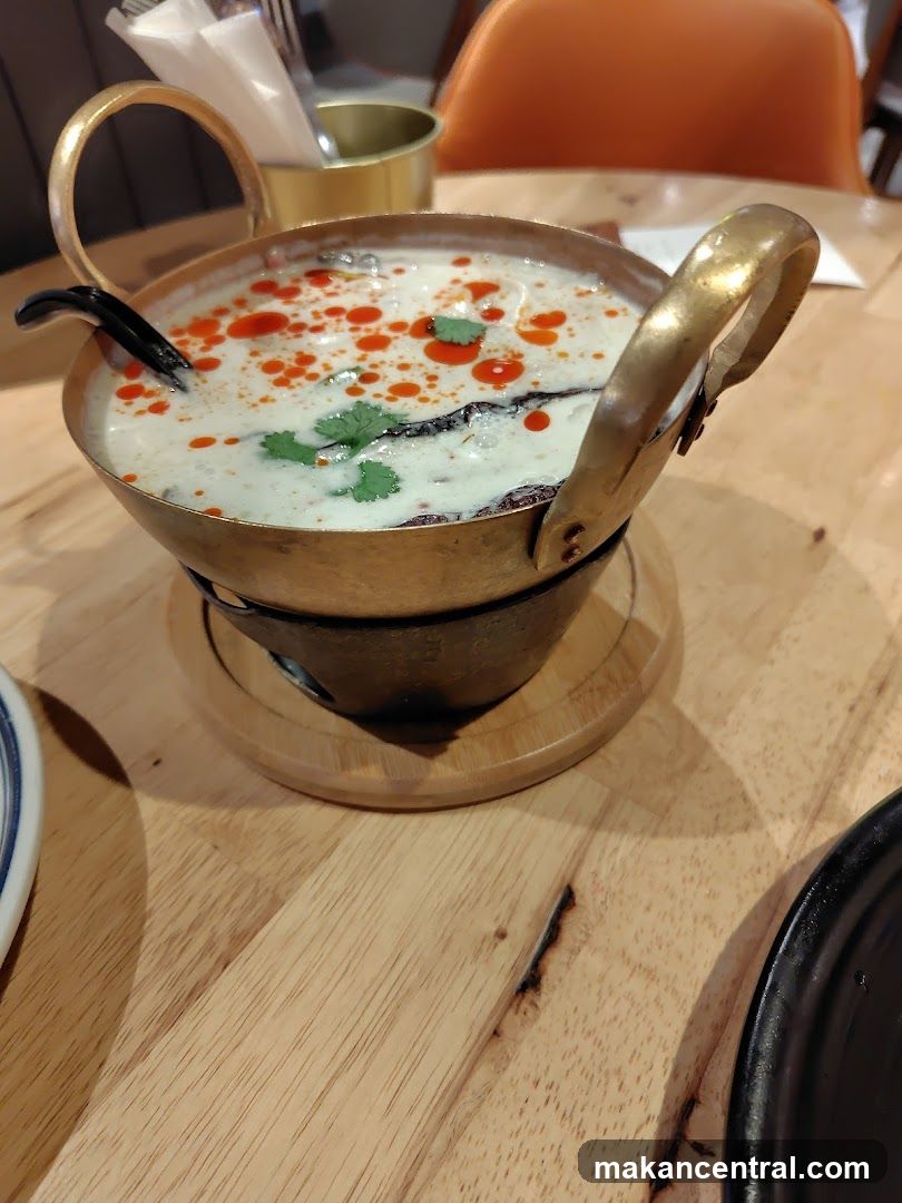Food served in brass pot