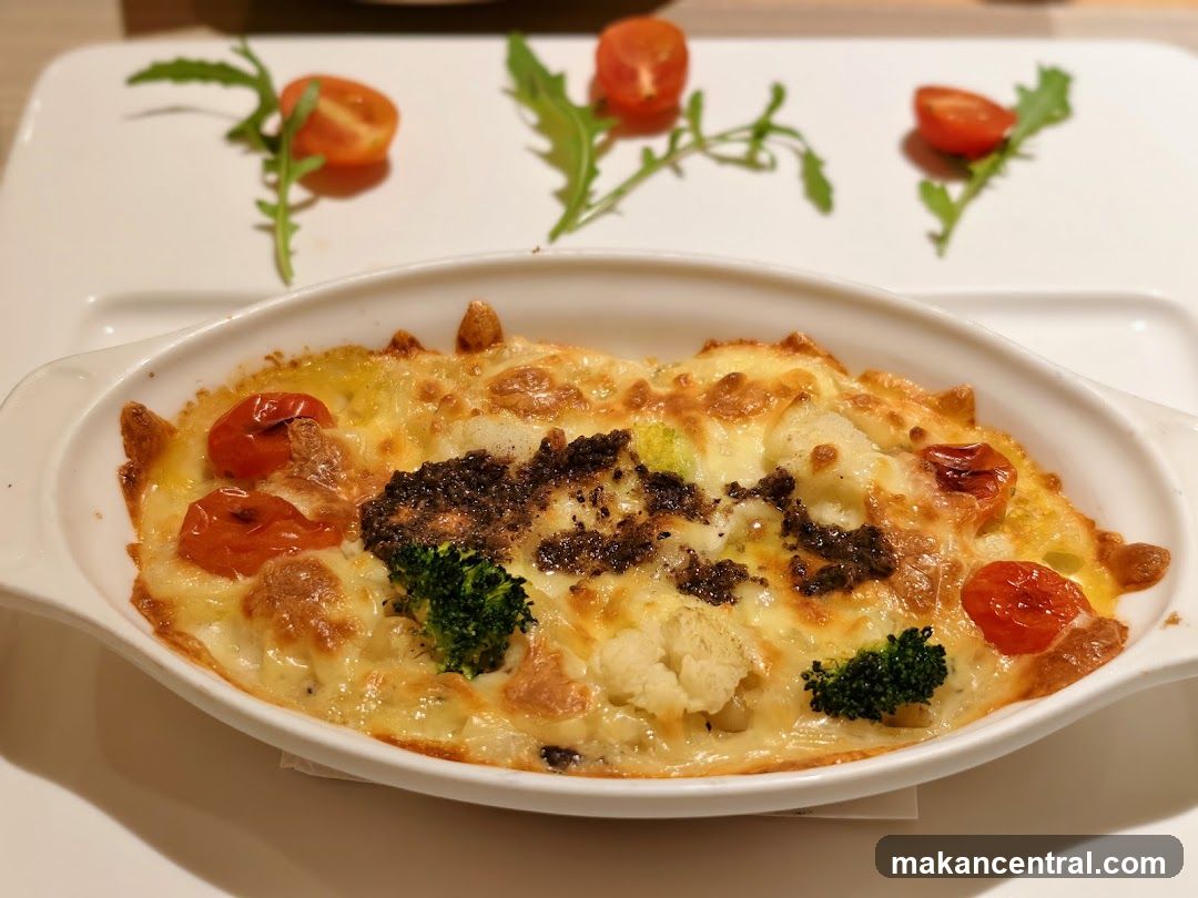Baked dish with cheese and vegetables