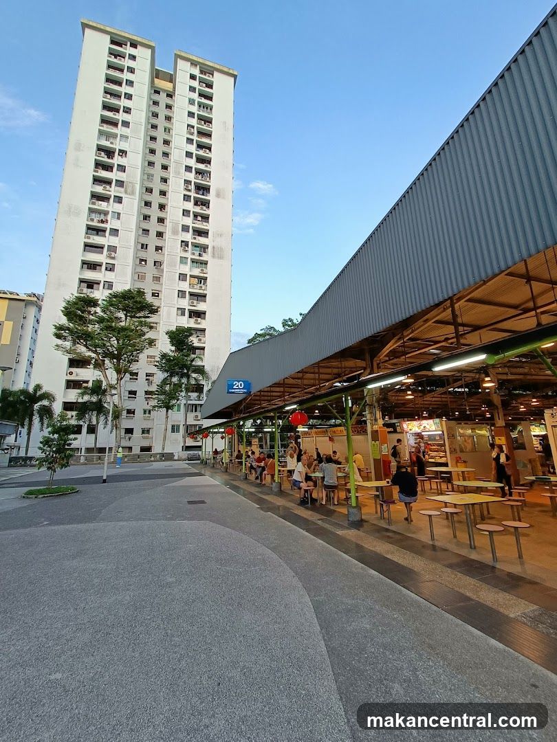 Outdoor food court with high-rise residential building