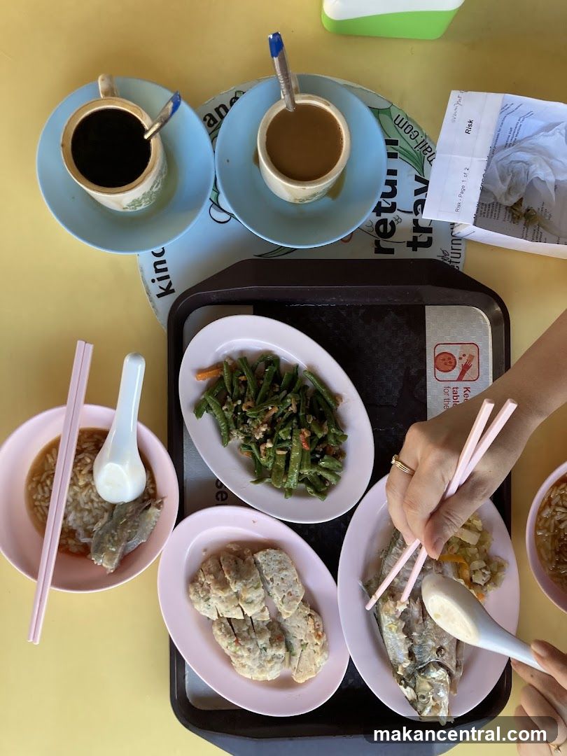 Tableside meal with beverages and dishes
