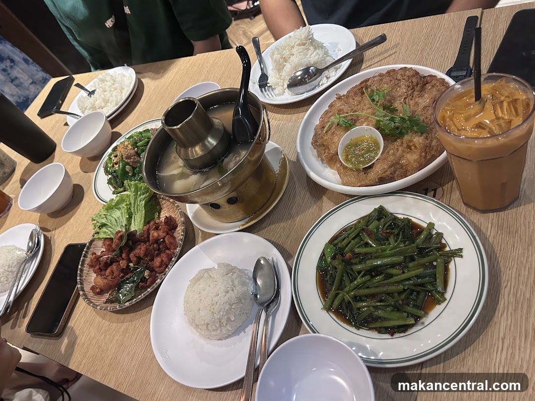 Table with Thai dishes