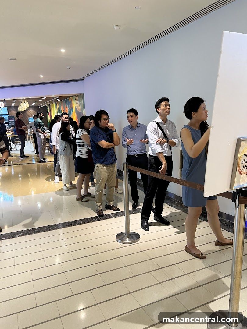 Group of people in a shopping mall interior